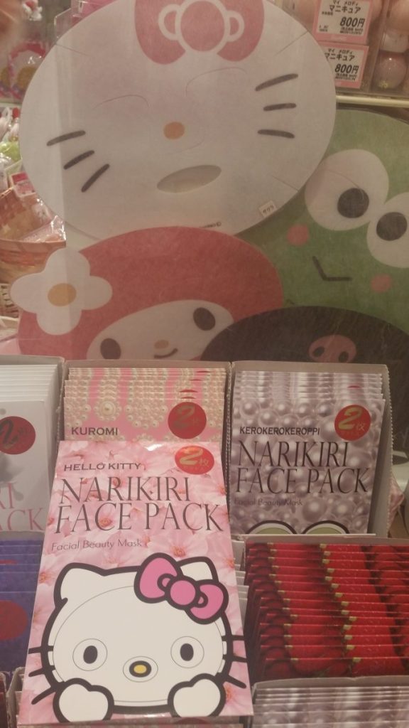 Hello Kitty sheet face masks with cut out holes for eyes, nose and mouth